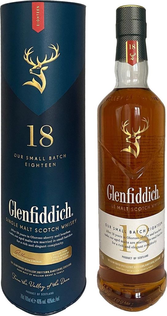 A bottle of Glenfiddich 18 Year Old single malt Scotch whisky and its cylindrical presentation box, both featuring the brand's stag logo and prominent '18' branding.