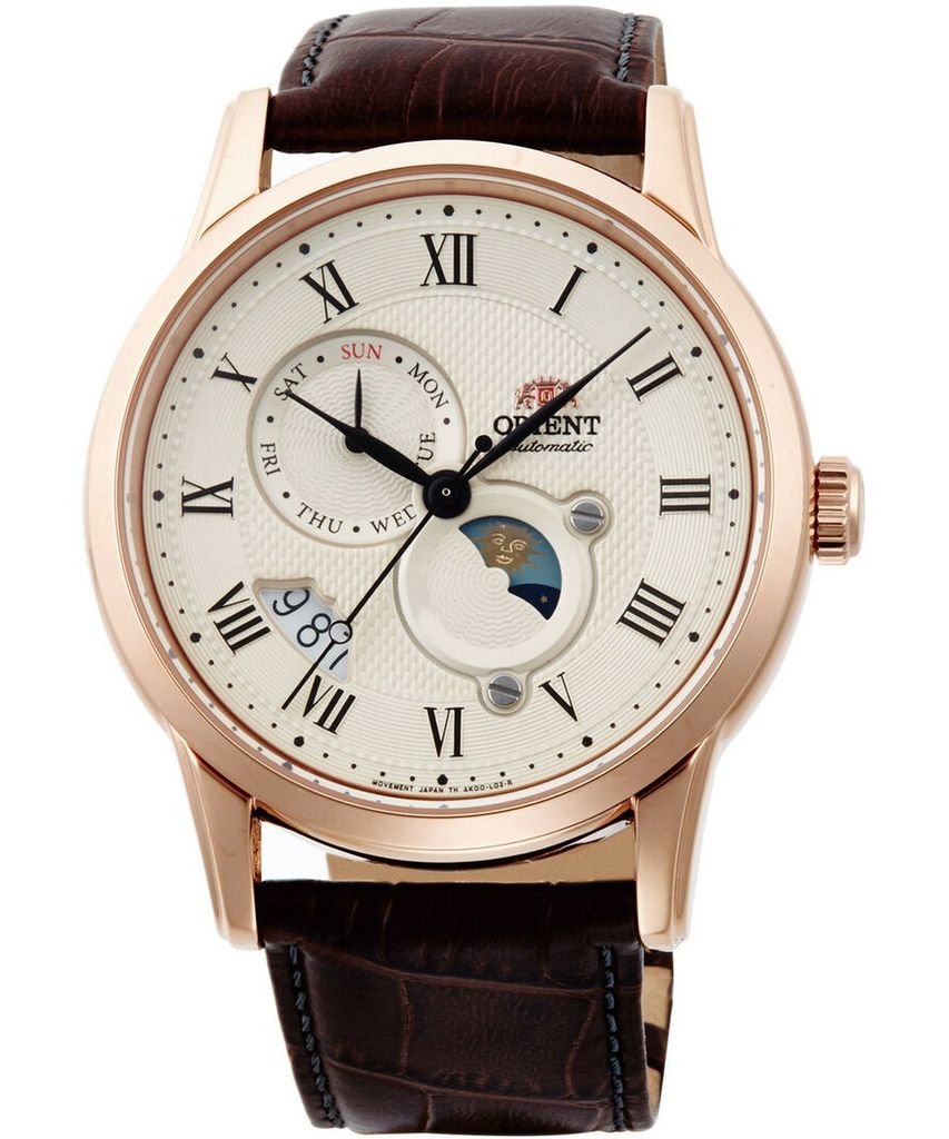 A close-up studio shot of a men's watch with a white dial, Roman numerals, and a brown leather strap.