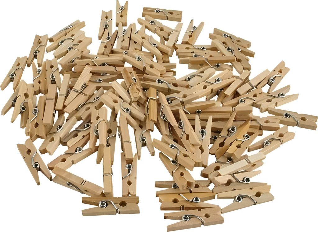 A pile of small wooden clothespins.