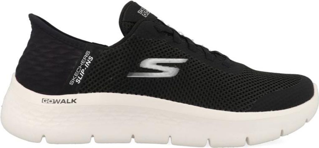 A side view of a black Skechers slip-on shoe with a white sole.