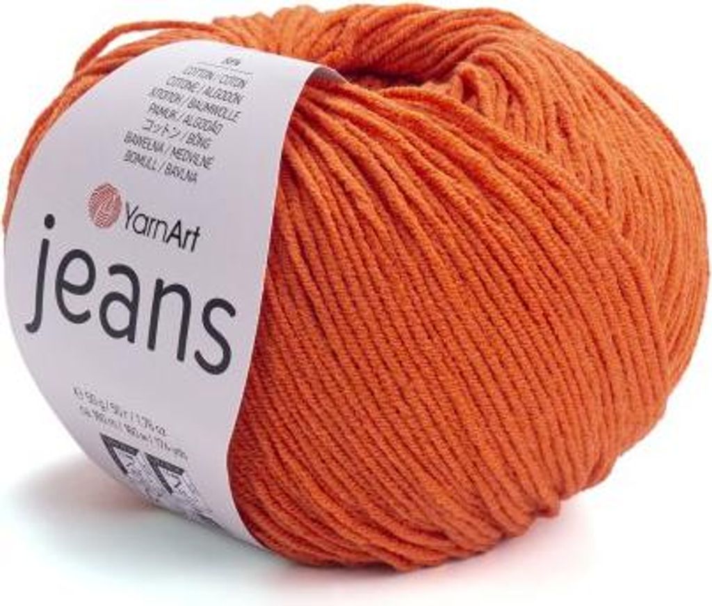 A ball of orange yarn with a label.