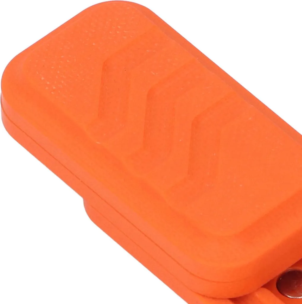 Poussoir tactile portable pour améliorer la concentration au bureau orange