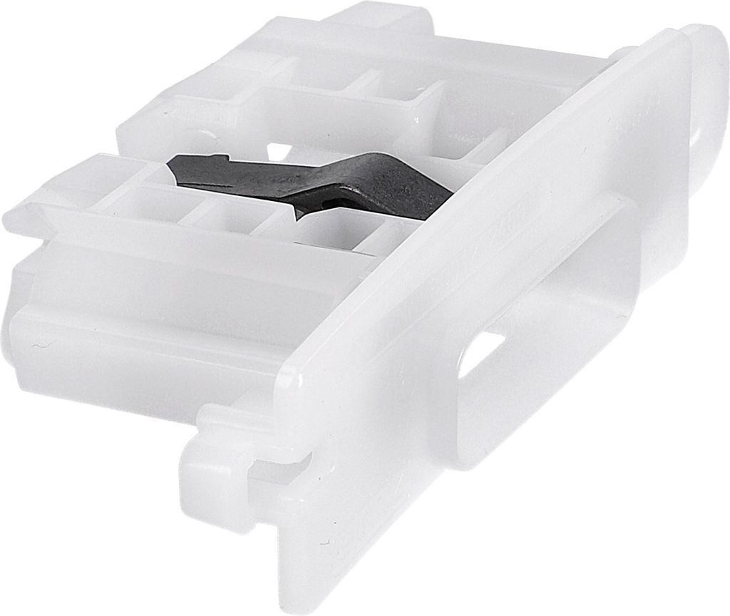 A close-up shot of a white plastic part with a small dark metal piece embedded in it.