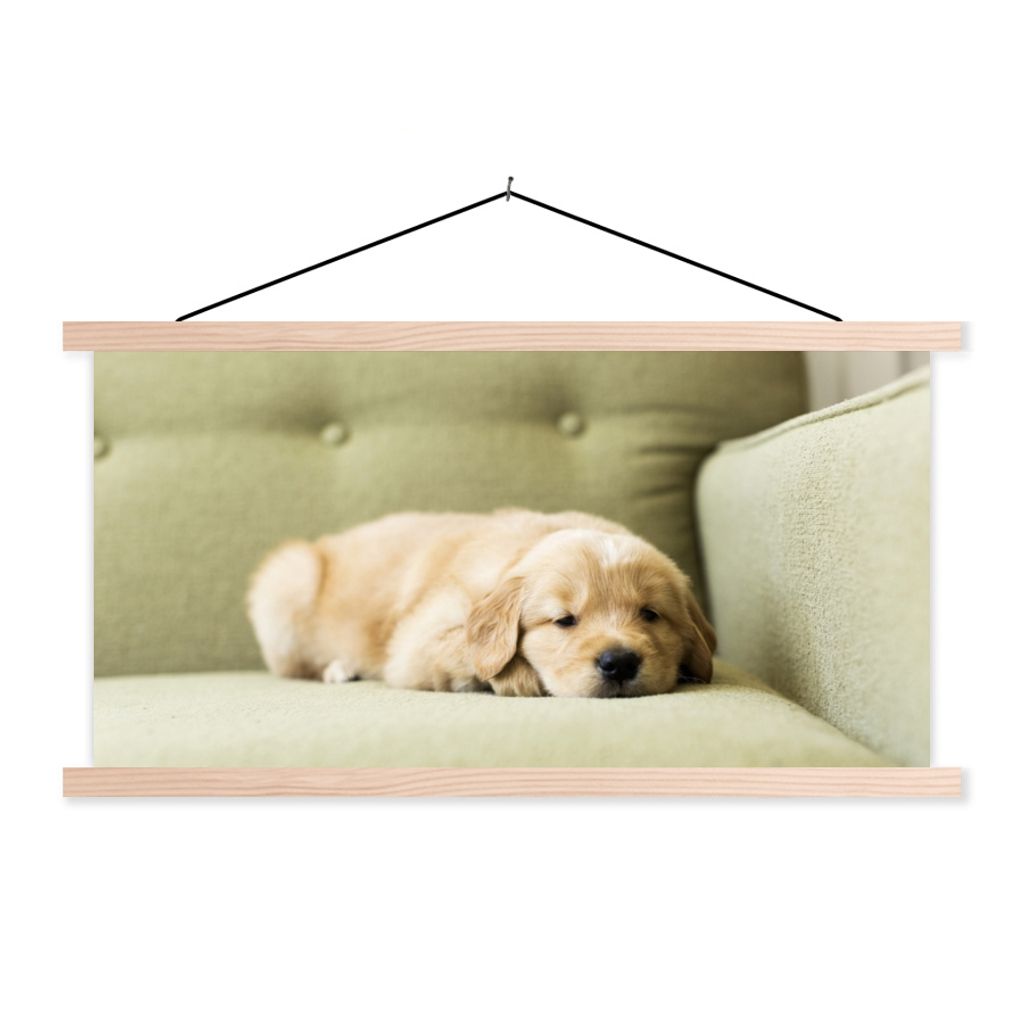 MuchoWow Textilposter Ein schlafender Golden Retriever Welpe auf dem Sofa 60x30 cm mit holzfarbenen Rahmen - Dekoration