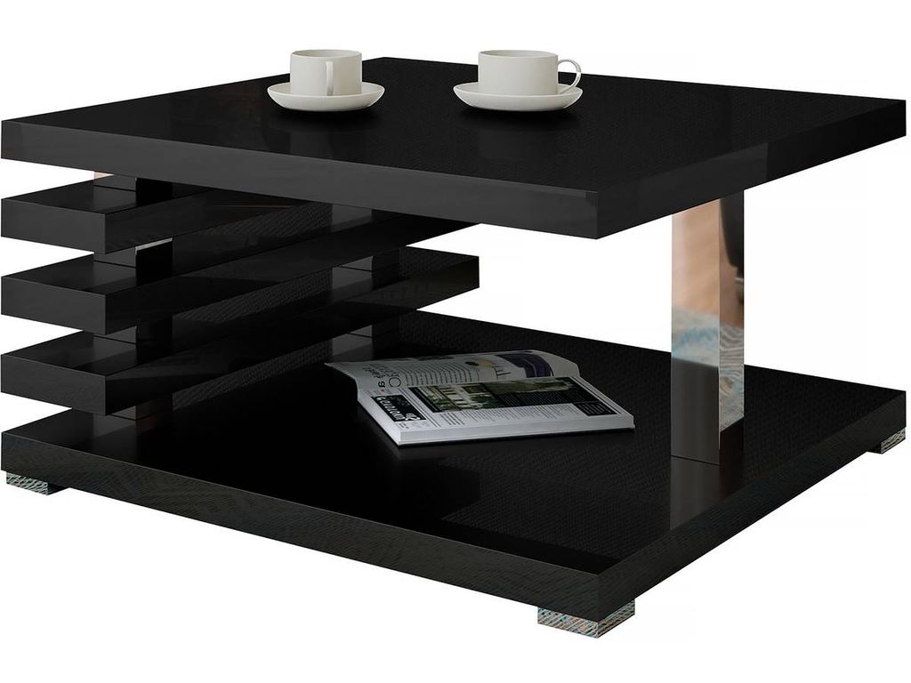 A modern black coffee table with a magazine on the lower shelf and two cups on the top shelf.