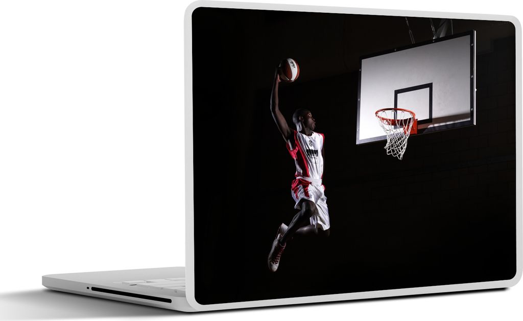 MuchoWow Laptop Aufkleber Sticker Cover Ein Basketballspieler wirft den Basketball in den Korb 31x22.5 cm - Laptop-Deko