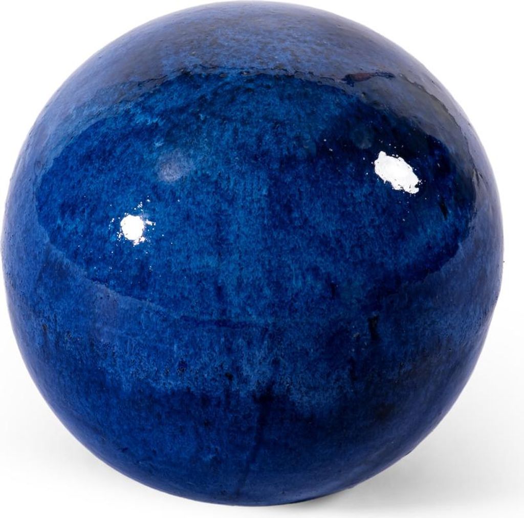 A close-up studio shot of a blue ceramic garden ball.
