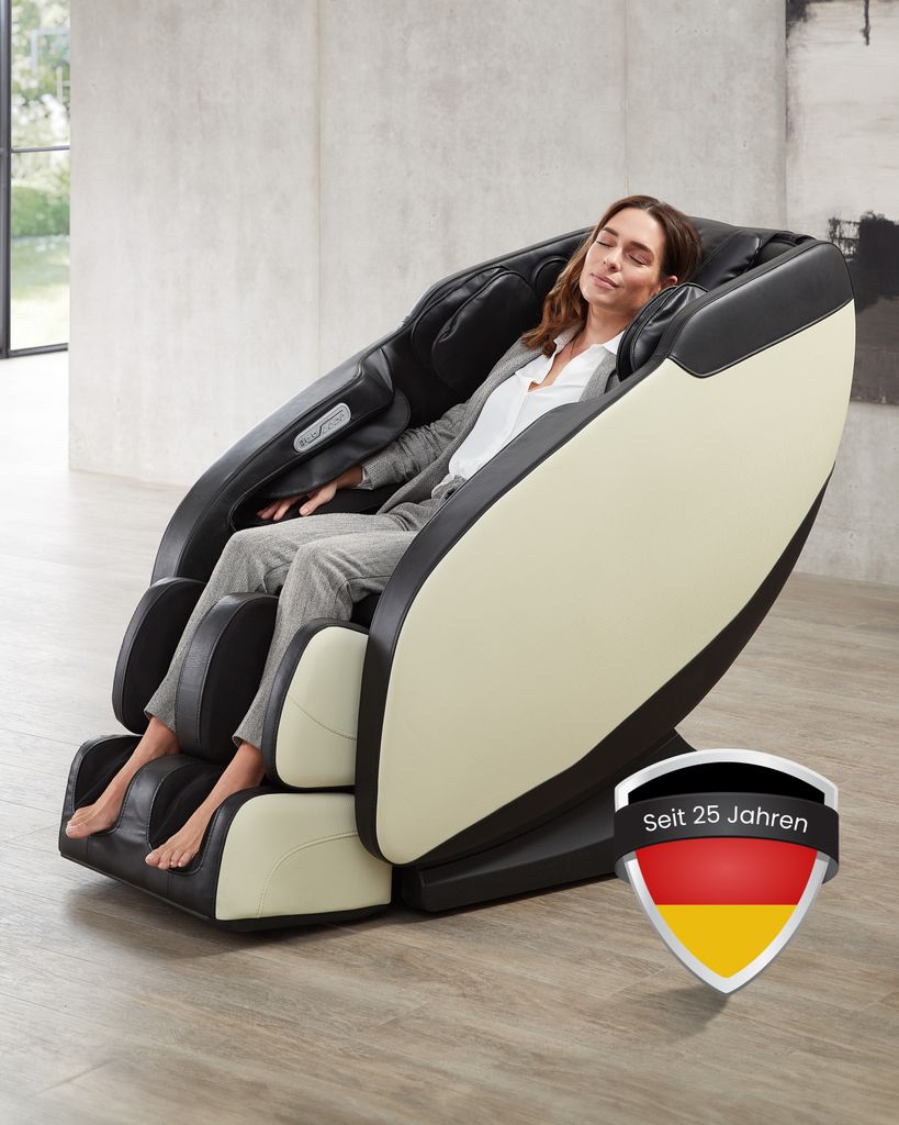 A woman is relaxing in a massage chair in a modern living room.