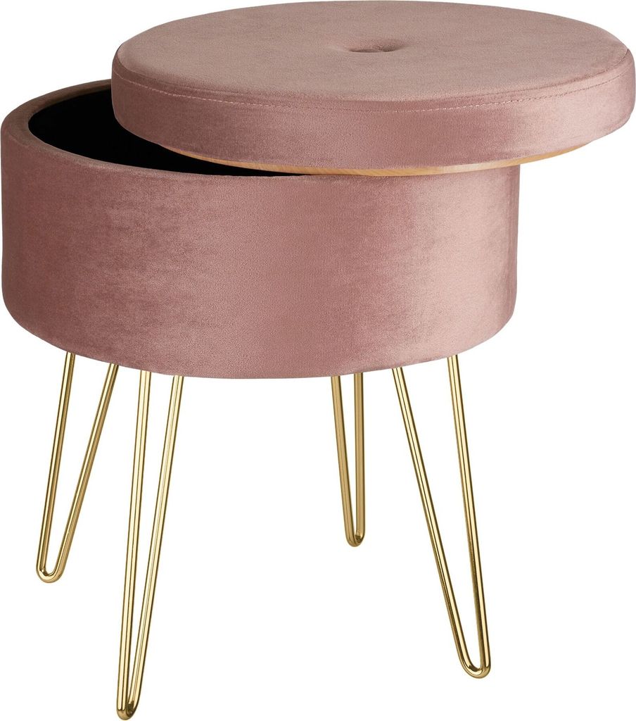 A pink velvet storage ottoman with gold hairpin legs, shown with its lid slightly ajar.