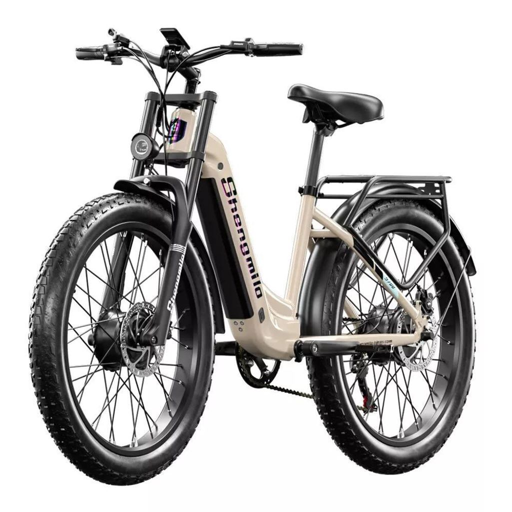 A studio shot of a beige electric mountain bike against a white background.