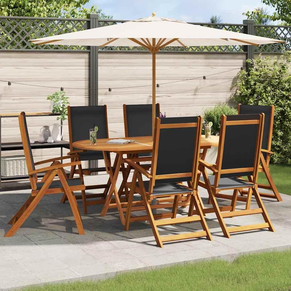 An outdoor dining set with a table, chairs, and umbrella on a patio.