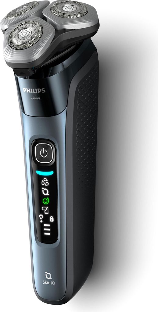 A close-up, studio shot of a Philips electric shaver against a white background.