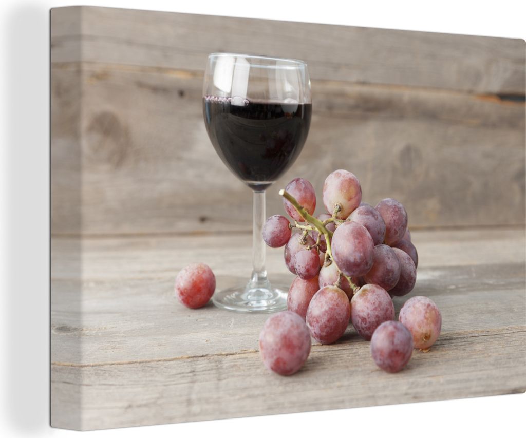 OneMillionCanvasses - Leinwandbilder - 140x90 cm, Frisch gepflückte rote Weintrauben und ein Glas Wein, Wandbilder Kunstdruck Wanddekoration - F...