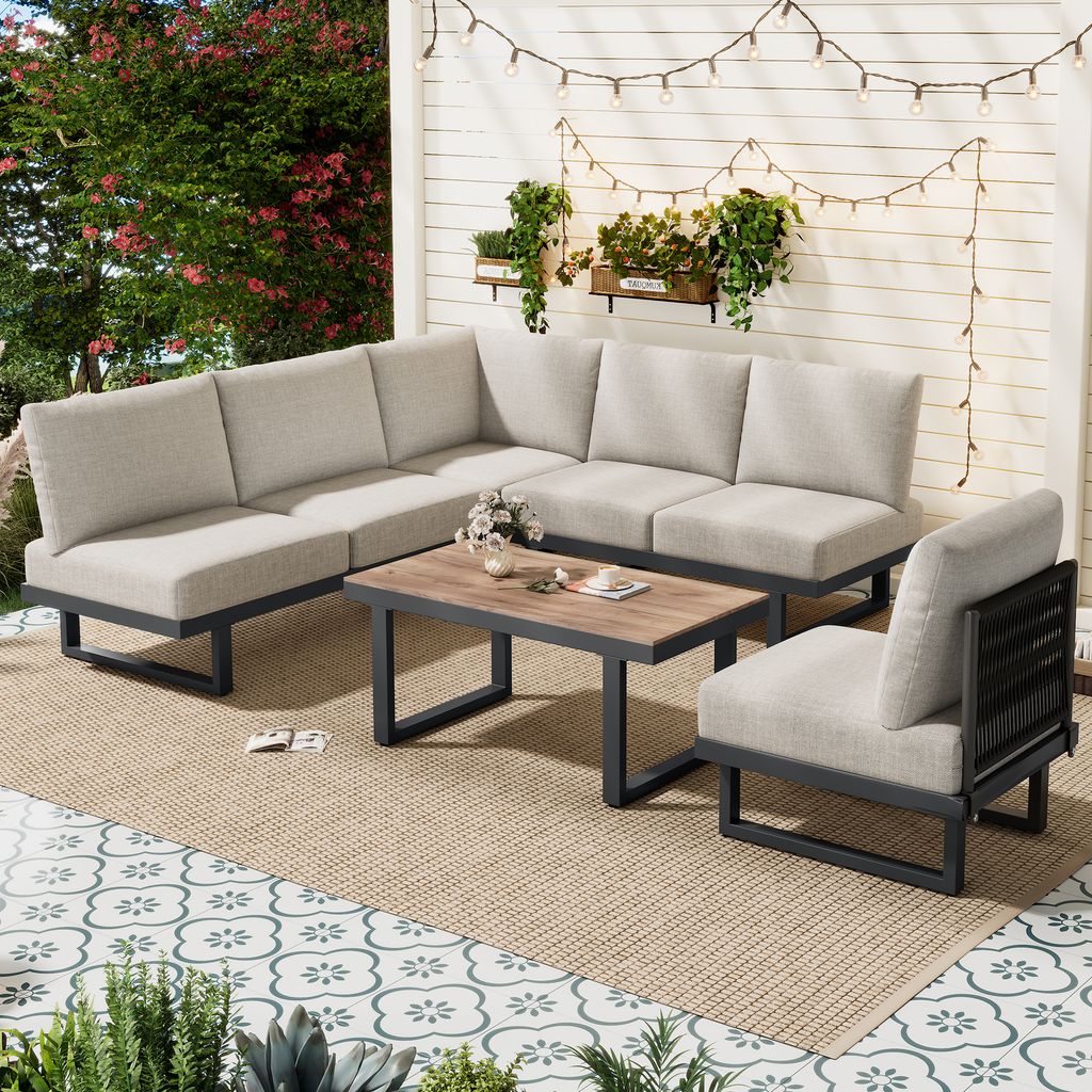 A 5-piece outdoor furniture set on a patio with string lights and plants.