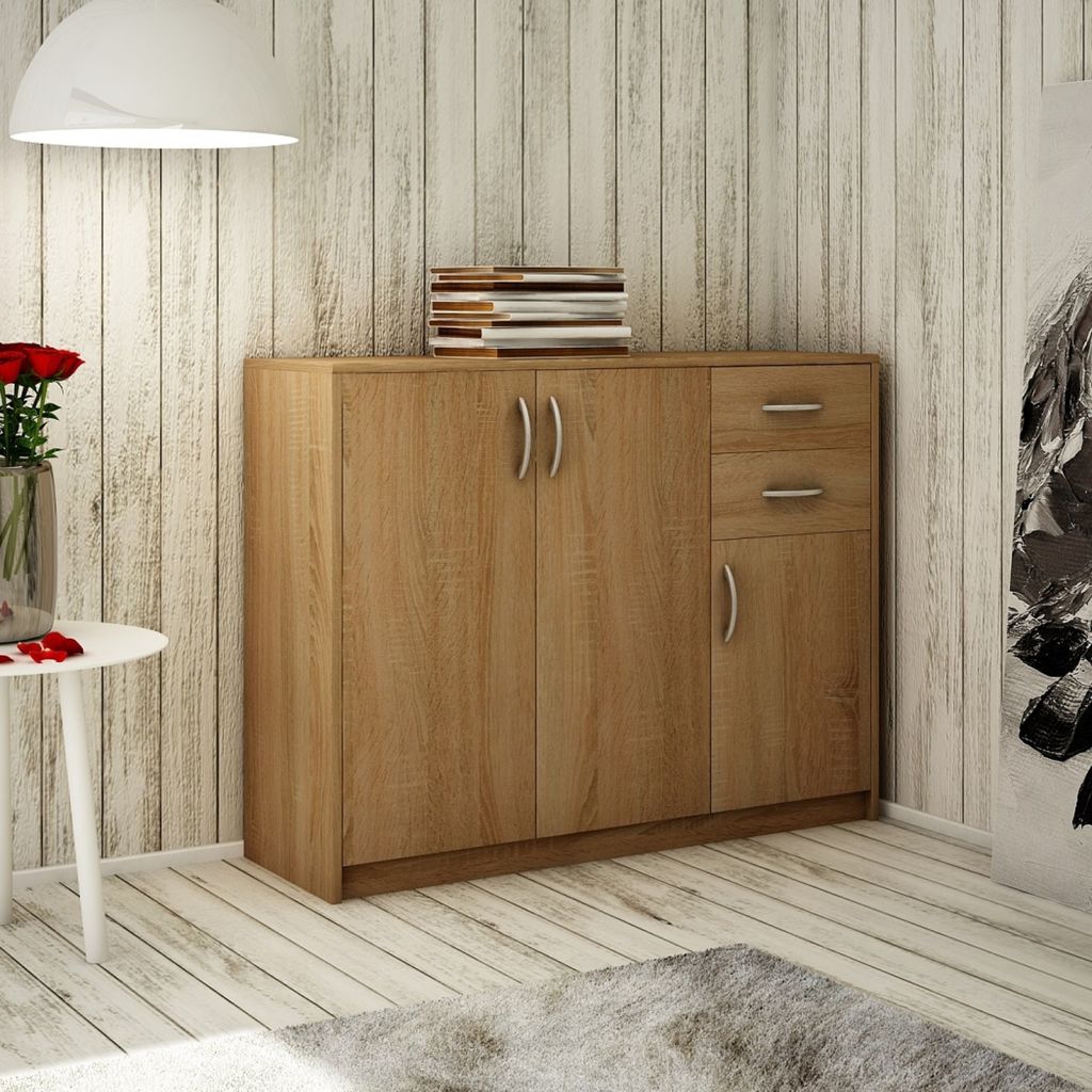 A wooden cabinet with drawers and doors in a room with wooden walls and flooring.