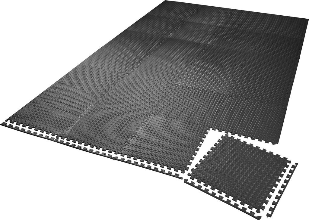 A set of interlocking floor mats laid out on a white background.