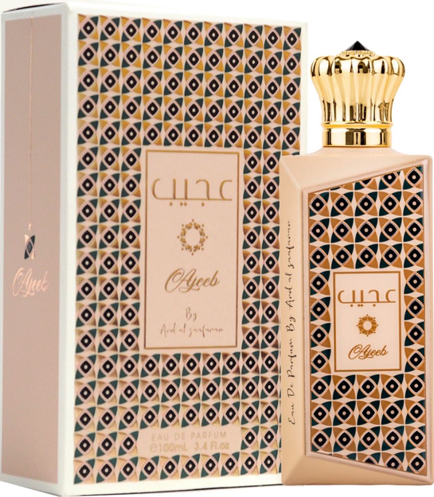 A perfume bottle and its packaging are displayed against a white background.
