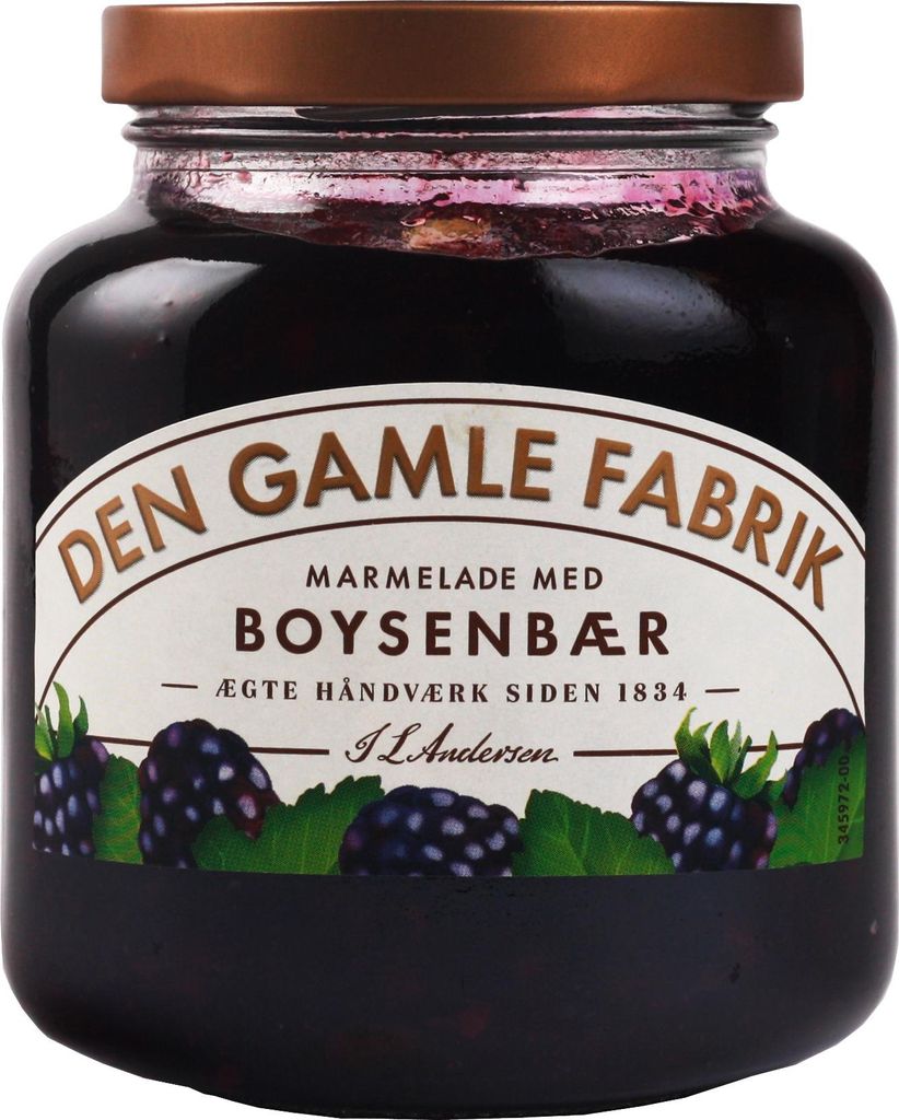 A jar of boysenberry jam with a label showing the brand, product name, and illustrations of boysenberries.