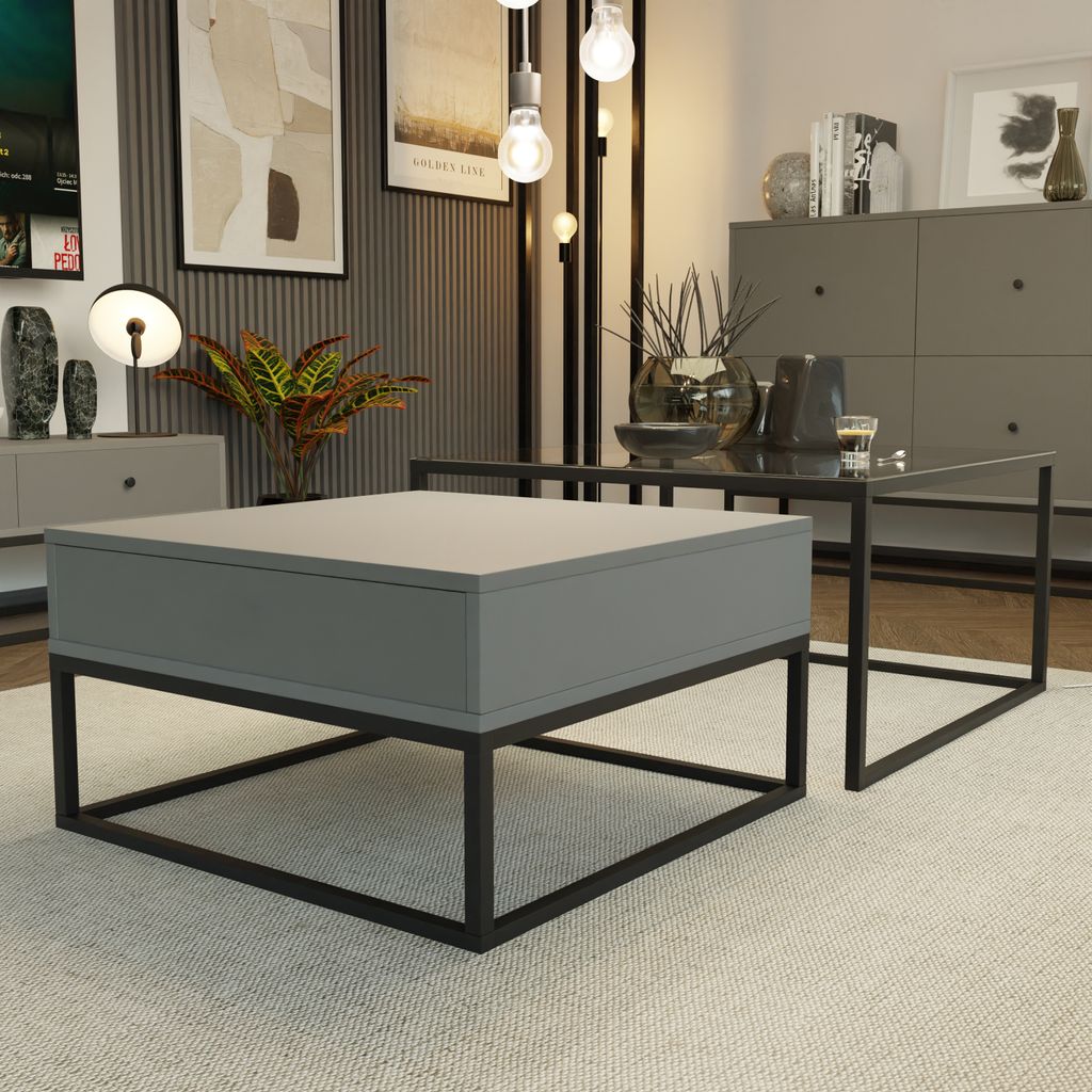A modern living room scene featuring two coffee tables, one with a drawer and storage, and a second glass-top table.