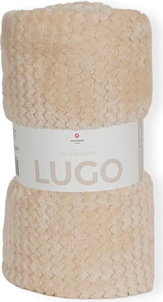 A rolled-up beige blanket with a label around it.