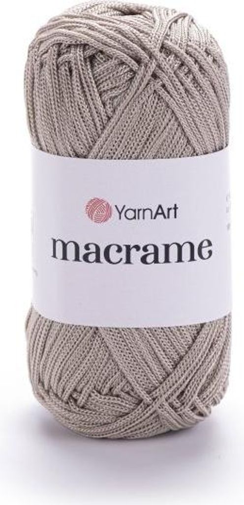 A ball of beige macrame yarn with a label.