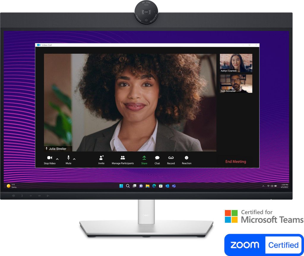 A computer monitor displaying a video conference call, with logos indicating certifications for Microsoft Teams and Zoom.