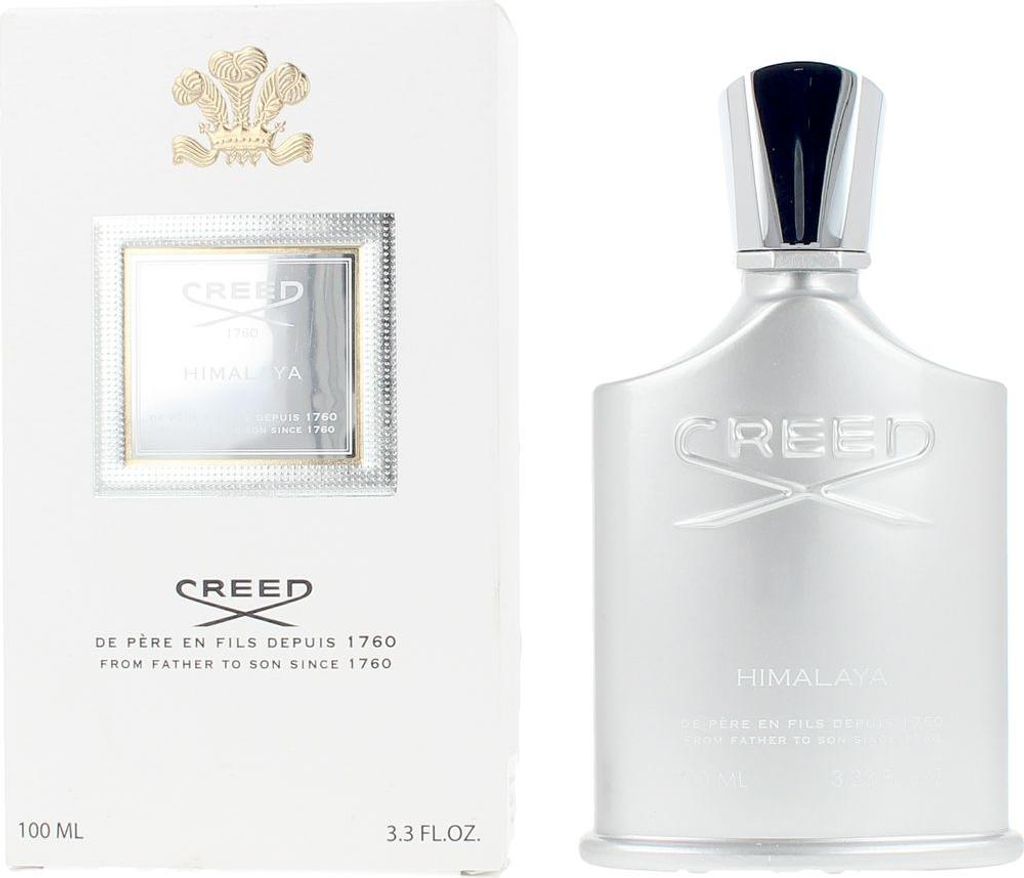 A product shot of a perfume bottle and its packaging.