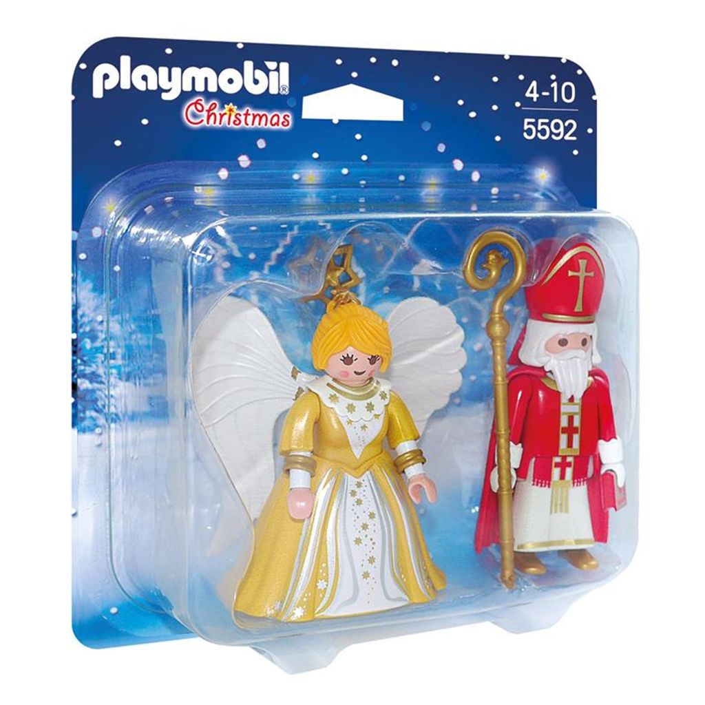 A Playmobil Christmas set featuring St. Nicholas and a Christmas angel, presented in its retail packaging against a snowy background.