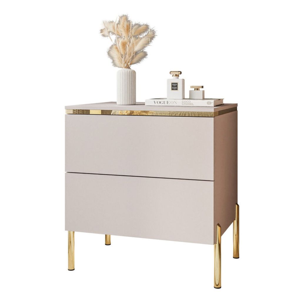 A modern bedside table with two drawers and golden legs, decorated with a vase of dried flowers and perfume bottles.