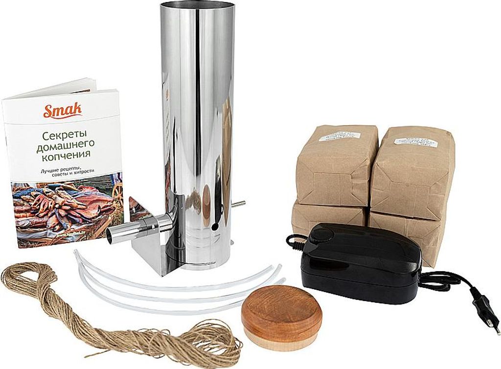 A collection of items for smoking food, including a smoker, bags of wood chips, a pump, and a booklet.