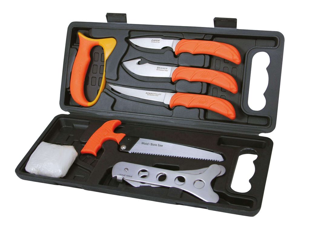 A set of knives and a saw in a black carrying case.