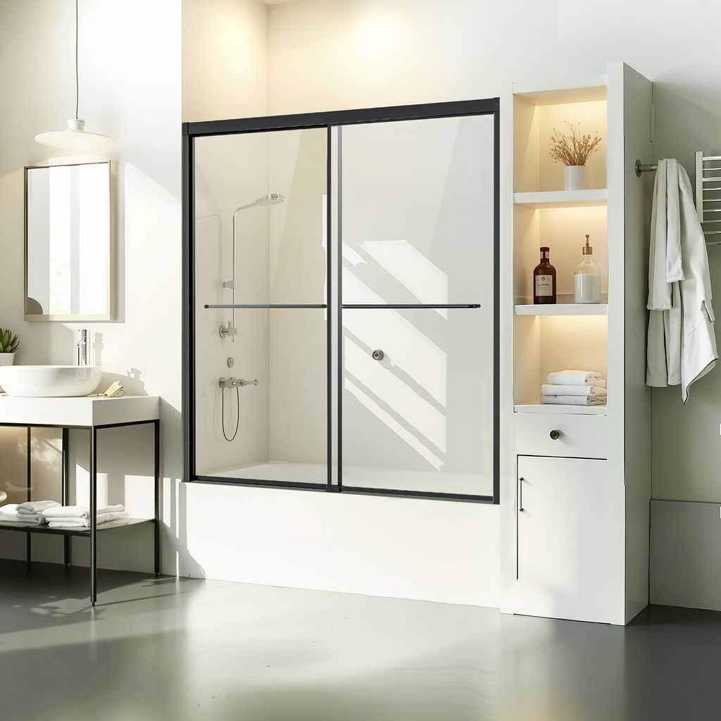 A modern bathroom with a bathtub shower door, vanity, and shelving unit.