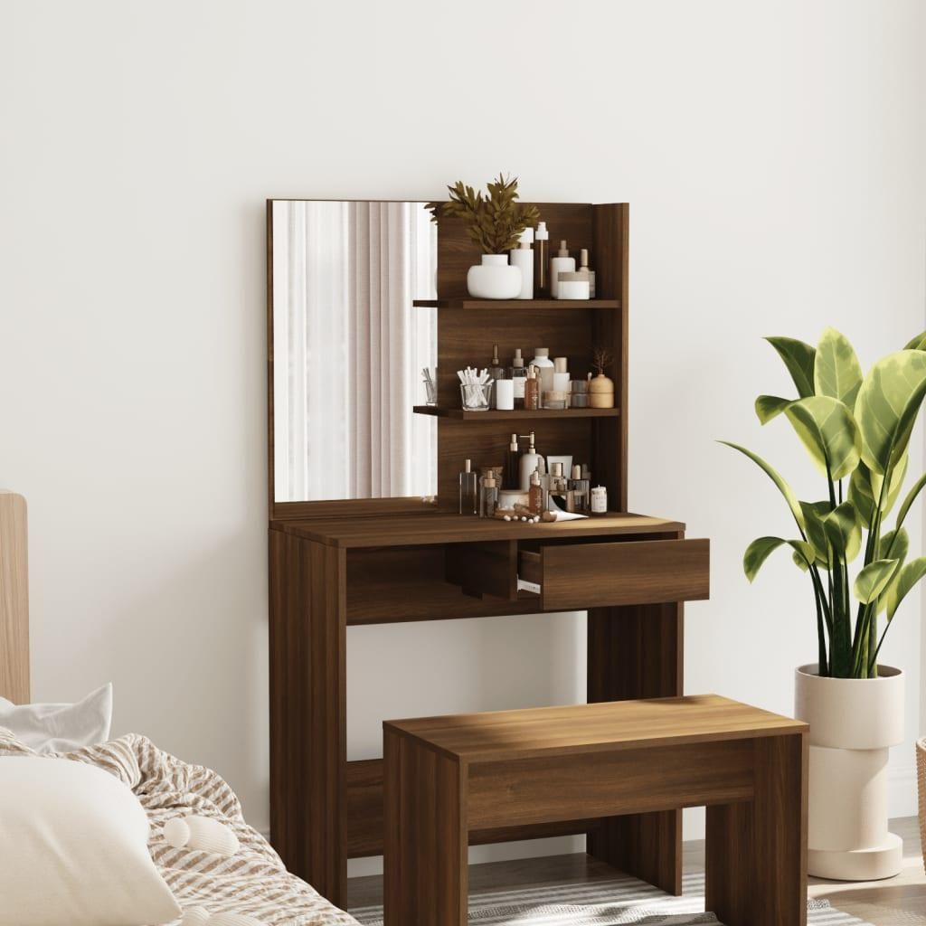 A vanity table with a mirror and shelves filled with various cosmetic products, placed in a room with a bed and a plant.