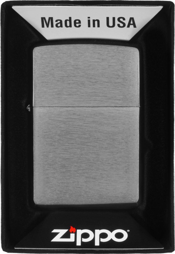A Zippo lighter is presented in its packaging.
