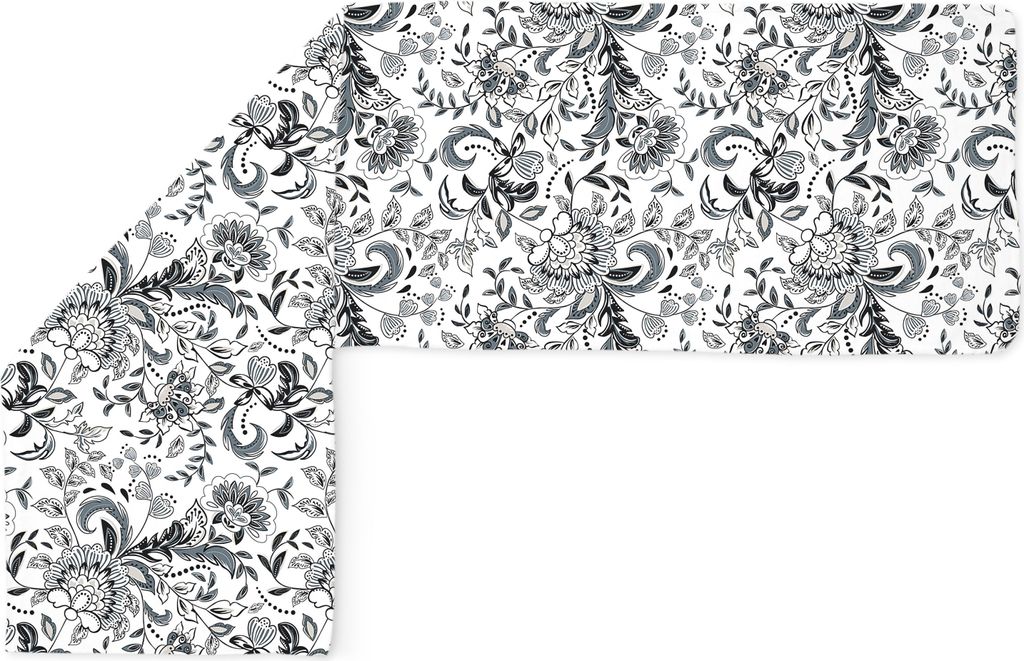 A floral patterned fabric cover is shown laid out on a white background, with one section bent at a right angle.