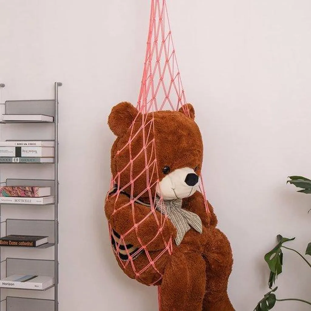 Dites adieu au désordre : hamac de rangement peluches d'angle mural