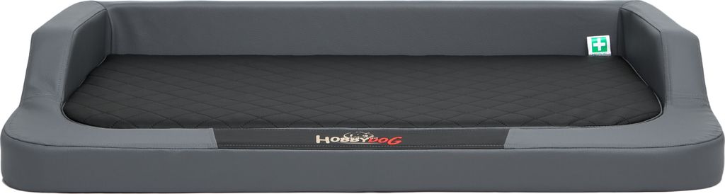 A gray orthopedic dog bed with a quilted black mattress.