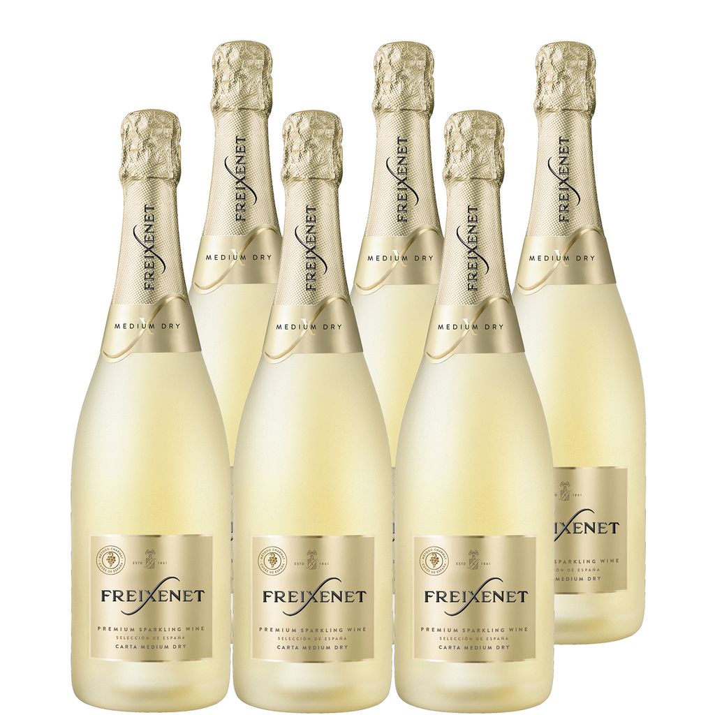 Six bottles of Freixenet sparkling wine arranged in a cluster.