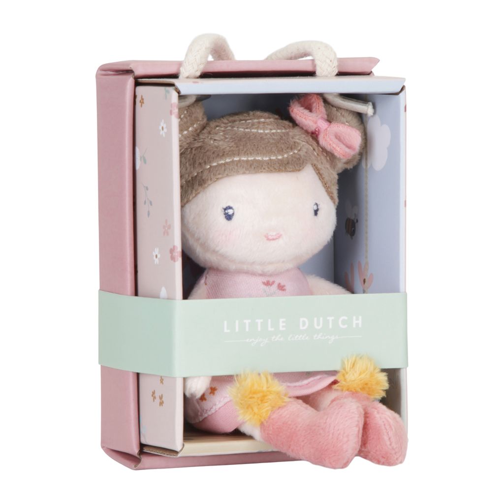 A plush doll in a pink gift box.