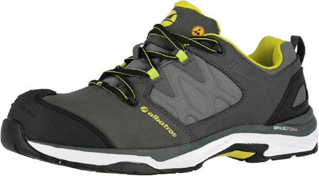 A single grey and yellow low-top safety shoe is shown against a white background.