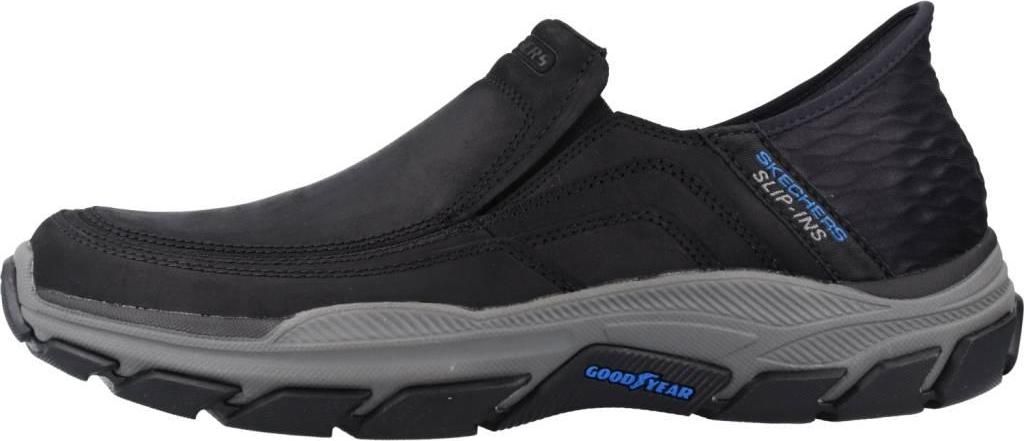 Side view of a black Skechers slip-on shoe with a gray sole.