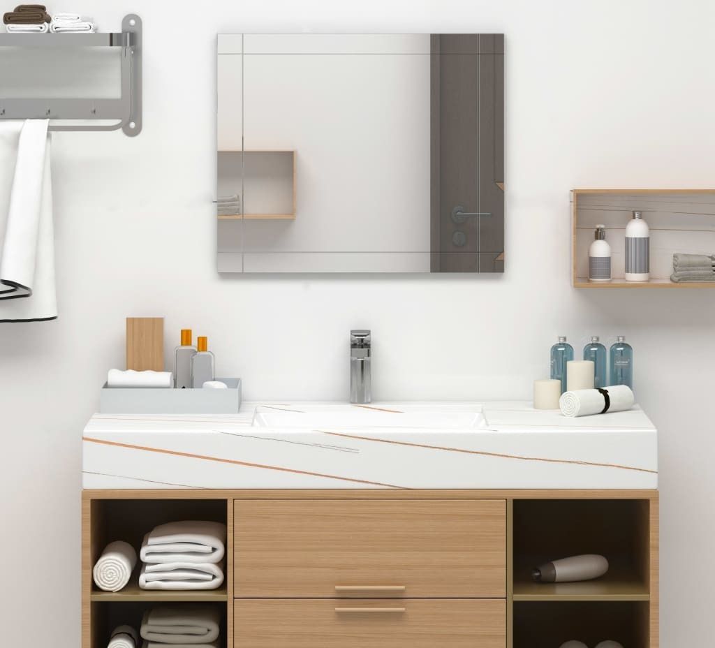 A bathroom vanity with a mirror, sink, and storage.