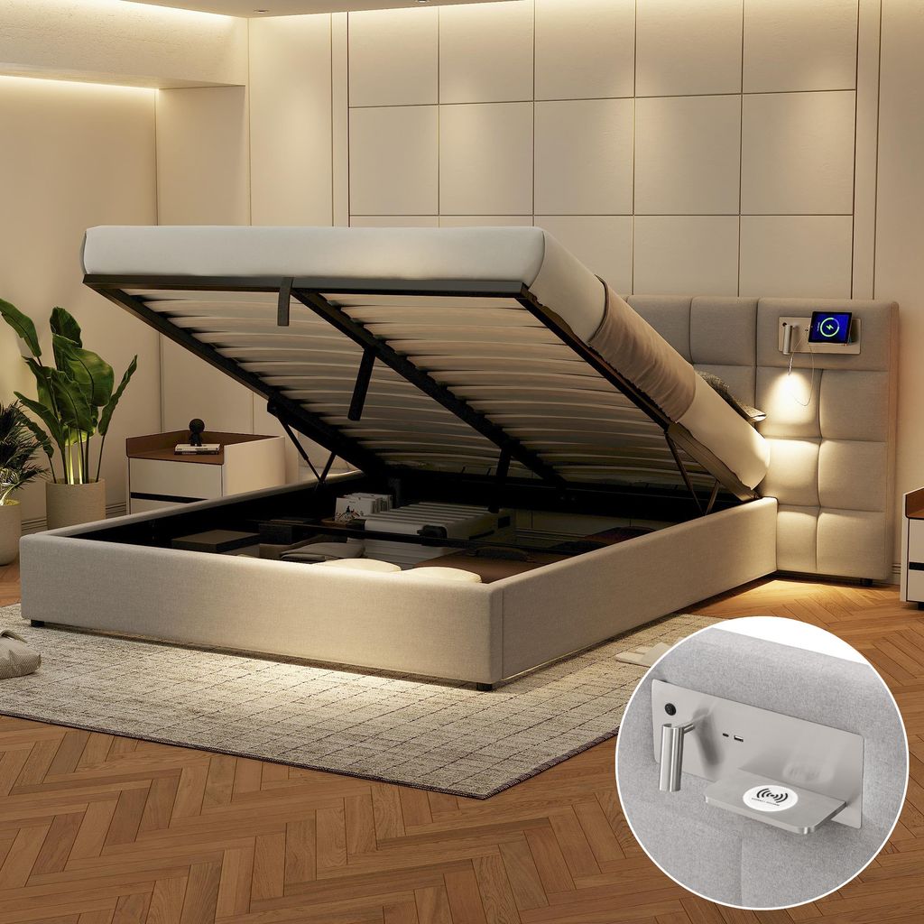 A modern bedroom with a bed that has its storage compartment open, revealing items inside. The bed has a tufted headboard with integrated lighting and a charging station.
