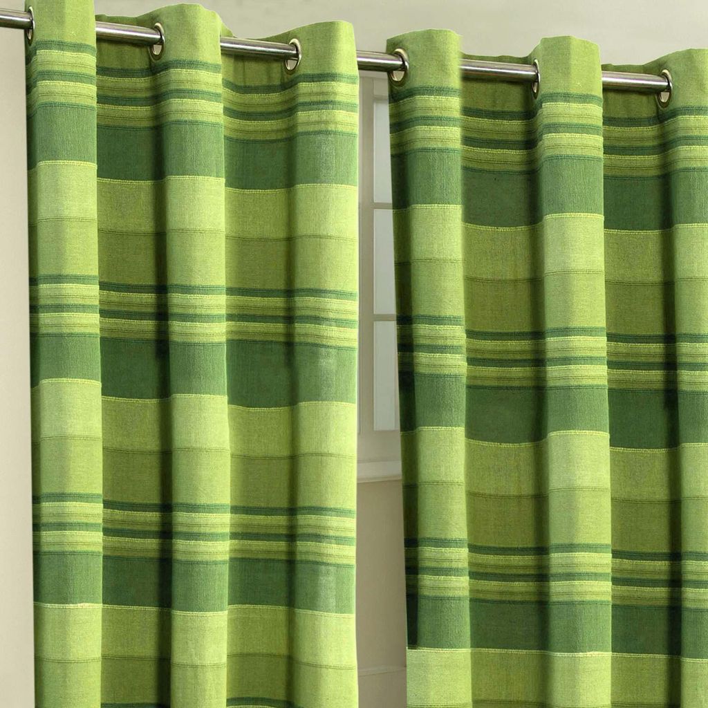 Two green striped curtains hanging on a rod.