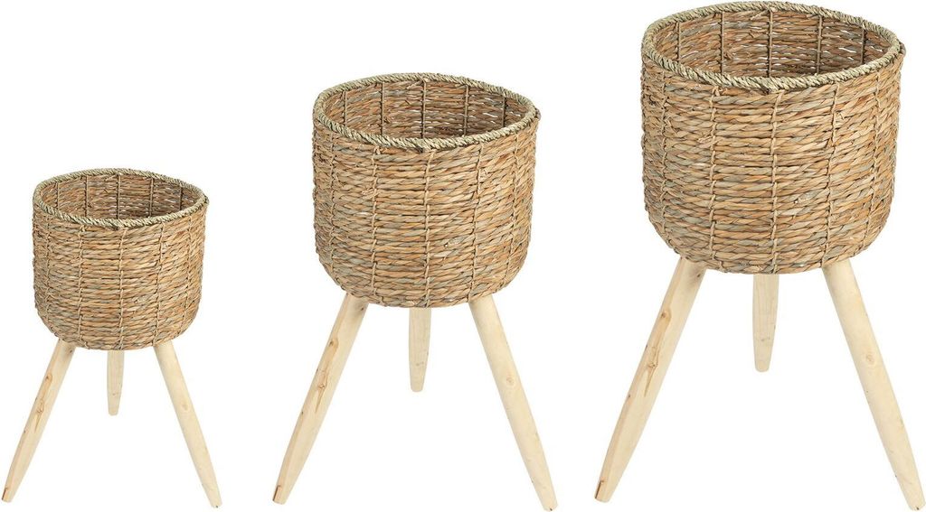 Three woven plant stands of varying sizes are displayed against a white background.