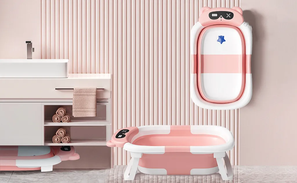 Baignoire bébé nomade rose capteur thermique et design pliable gain place