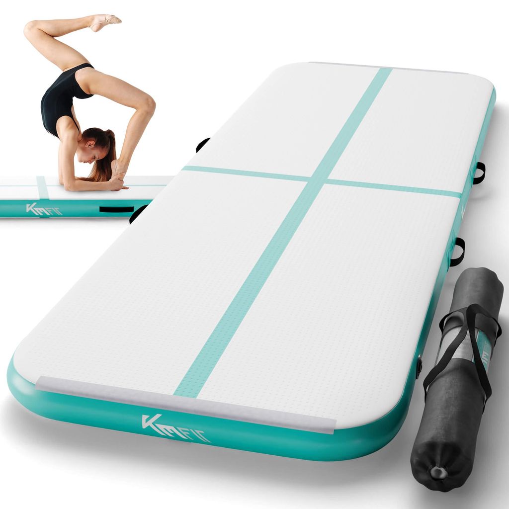 A gymnast is shown in a pose on an airtrack, with a separate airtrack and a rolled-up bag in the foreground.