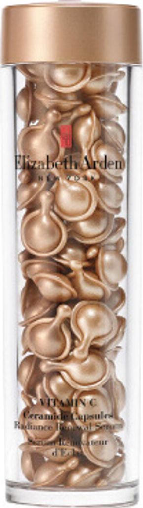 A clear, well-lit studio shot of a bottle filled with individual serum capsules.