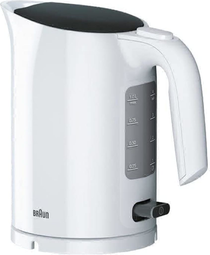 A white Braun electric kettle with a black lid and a gray water level indicator.