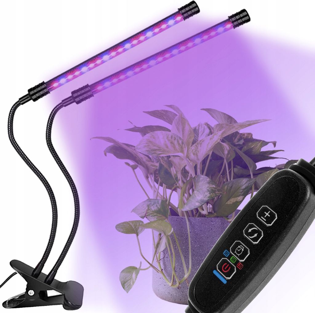 A plant grow light with two flexible arms is positioned above a potted plant, with the lights emitting a purple glow.